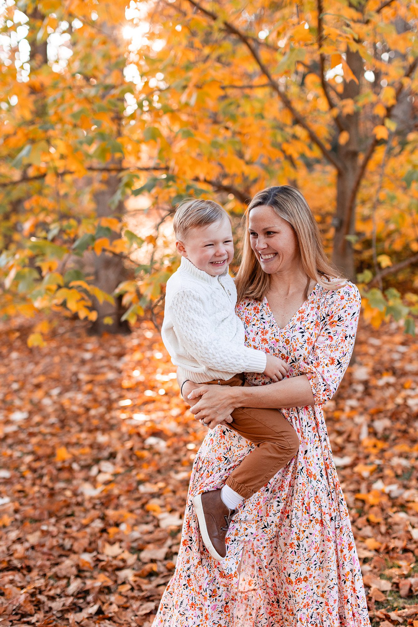 Boston Fall Family Photos - mom holding her son