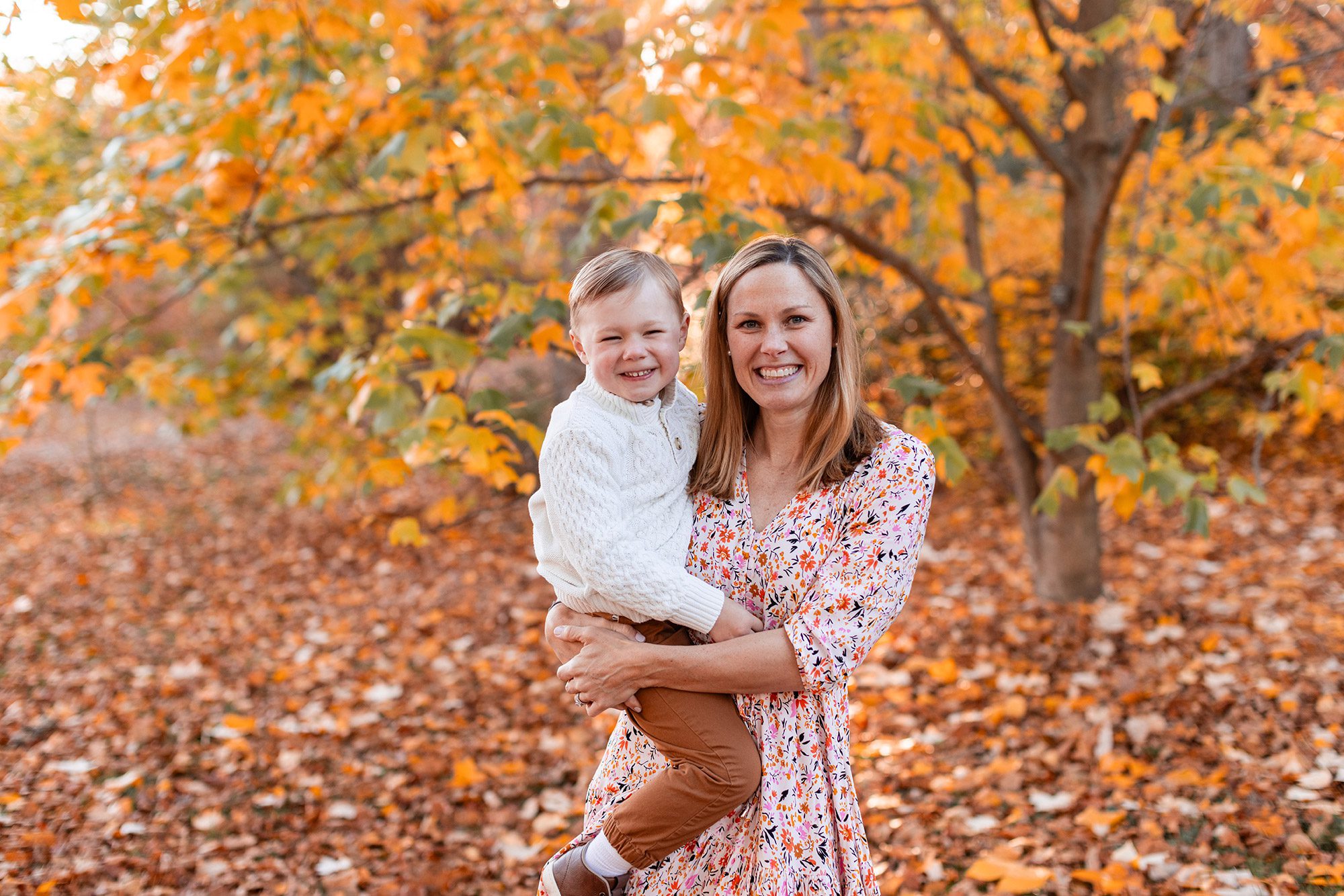 Boston Fall Family Photos - mom and son together with fall leaves