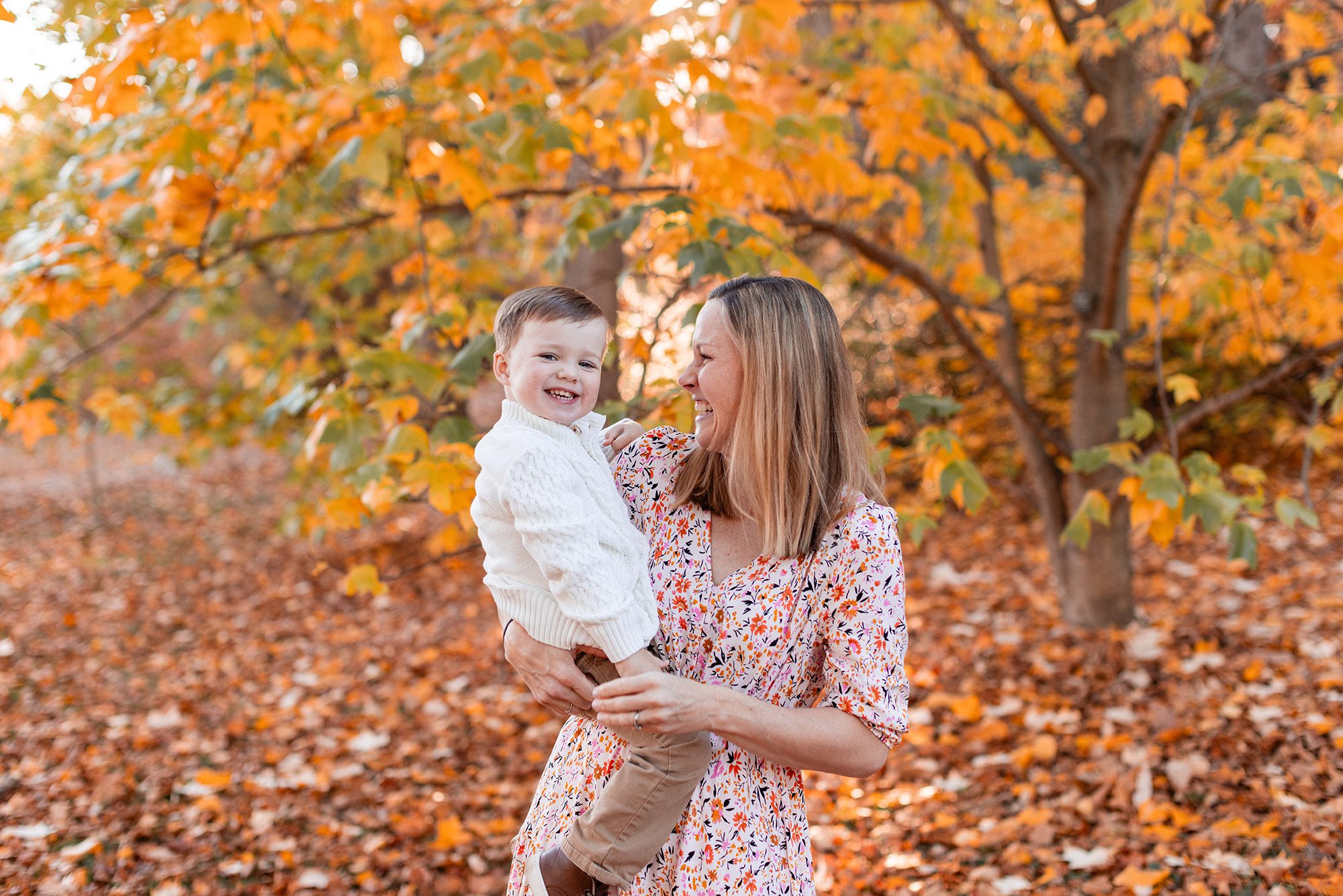 Boston Fall Family Photos - mom holding toddler boy