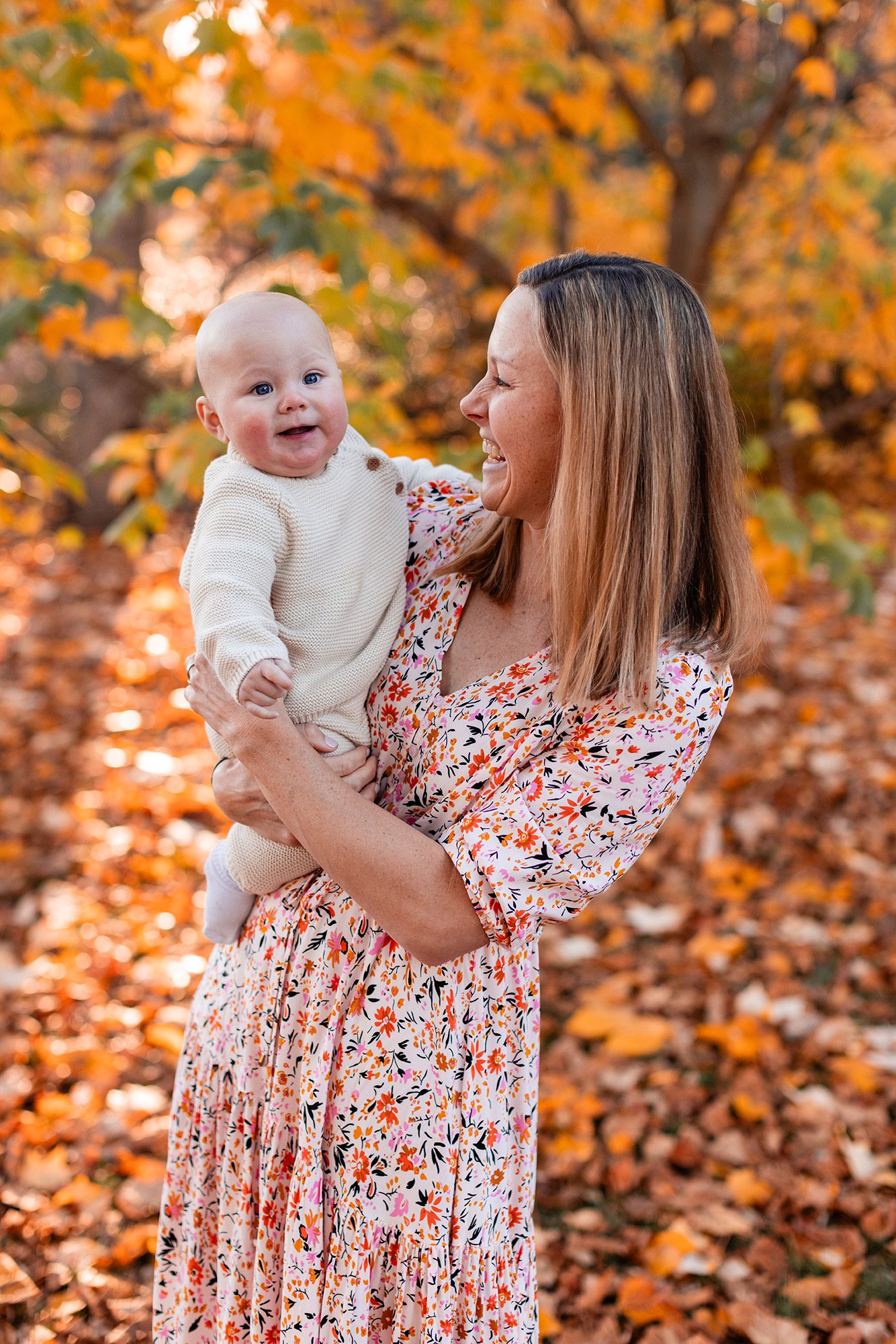 Boston Fall Family Photos - baby laughing in mama's arms