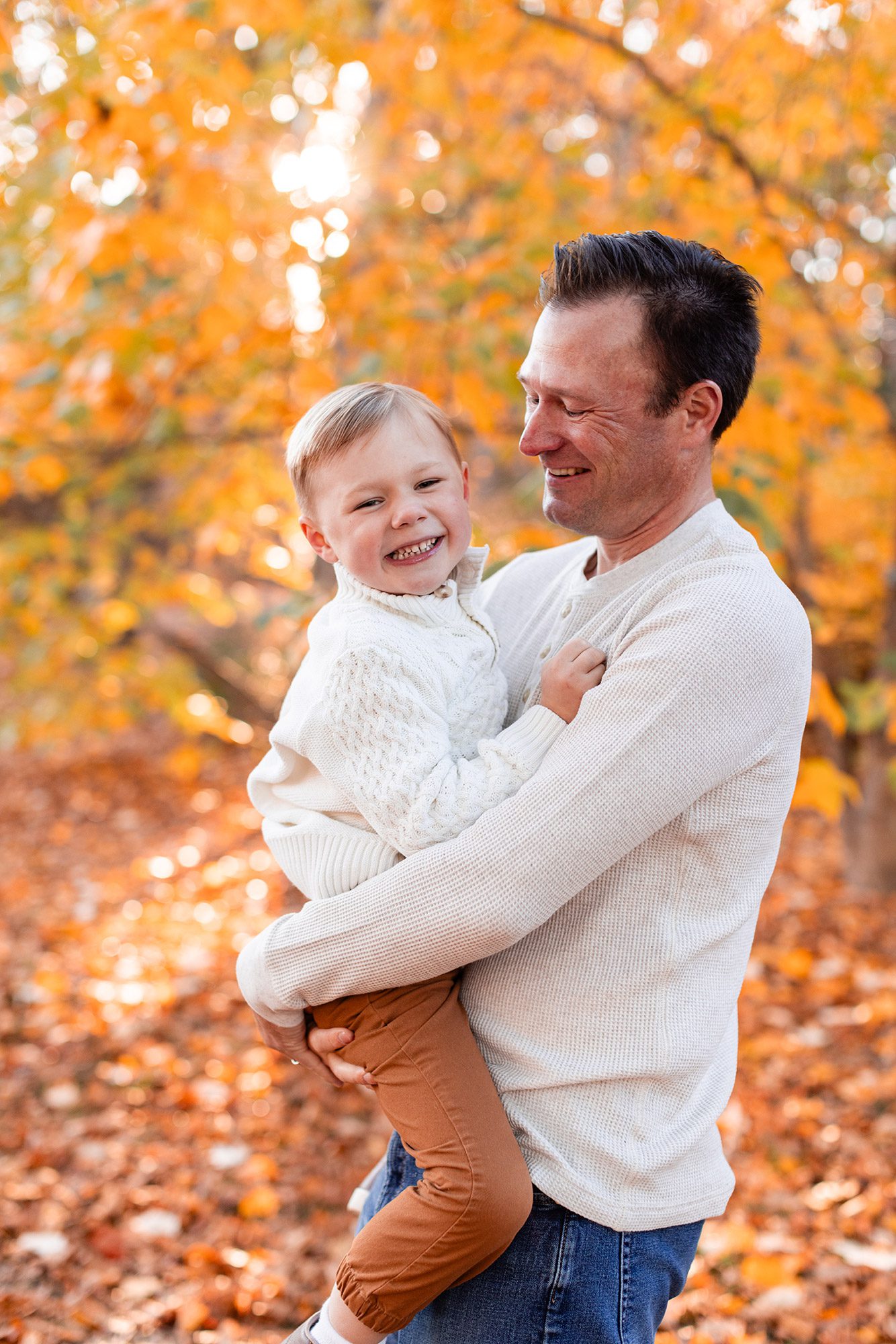Boston Fall Family Photos - dad and son laughing