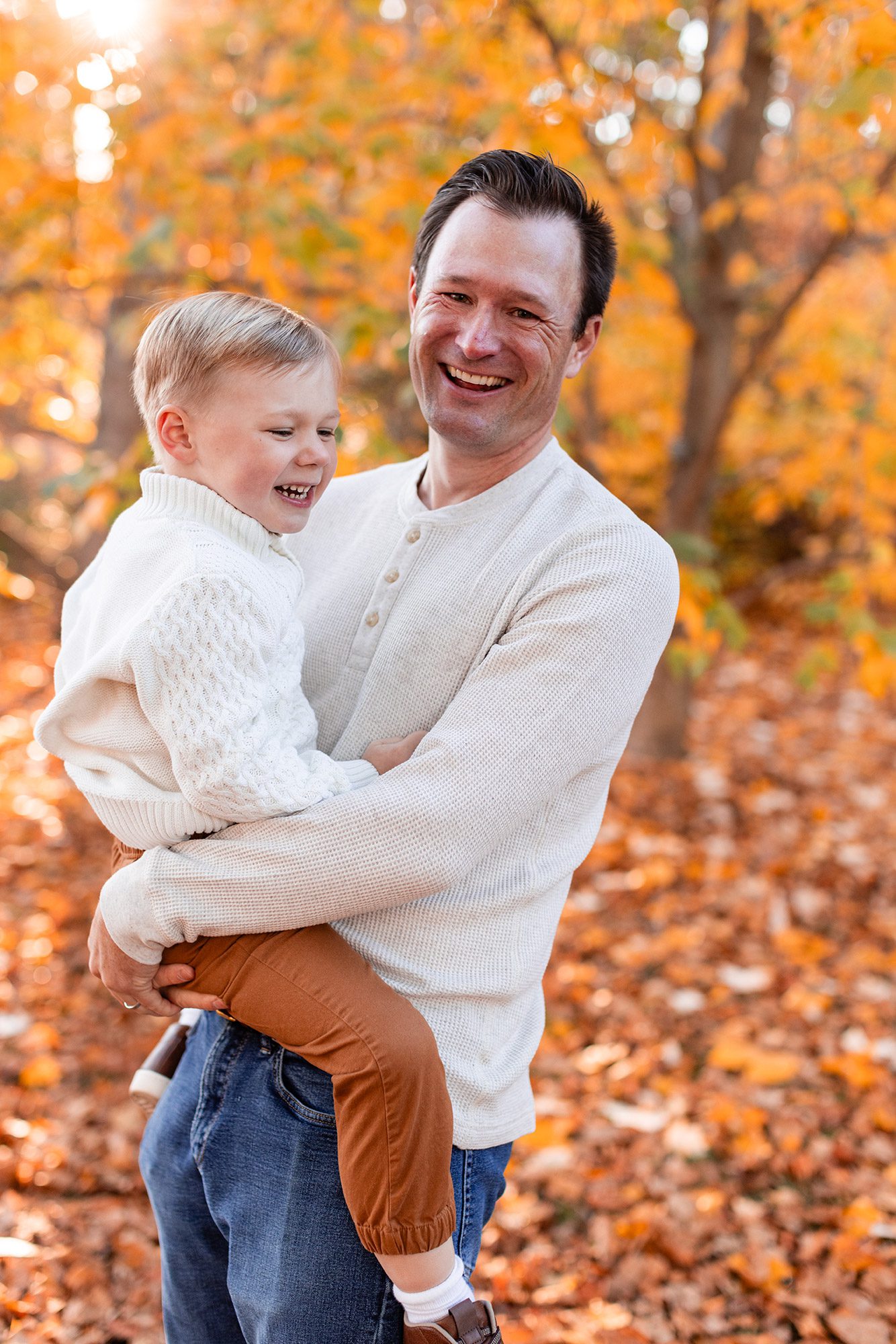 Boston Fall Family Photos - dad holding toddler boy