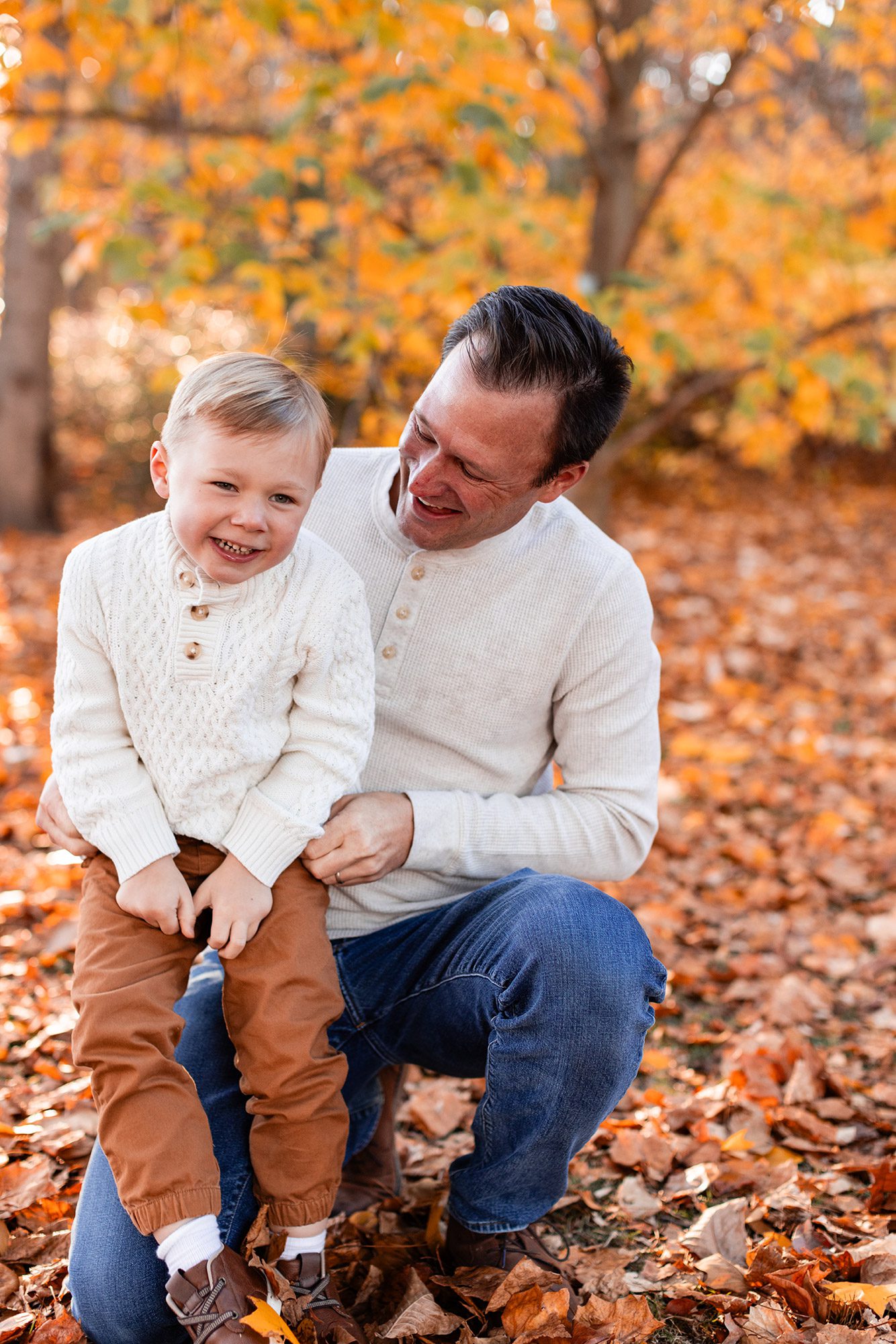 Boston Fall Family Photos - dad playing with son