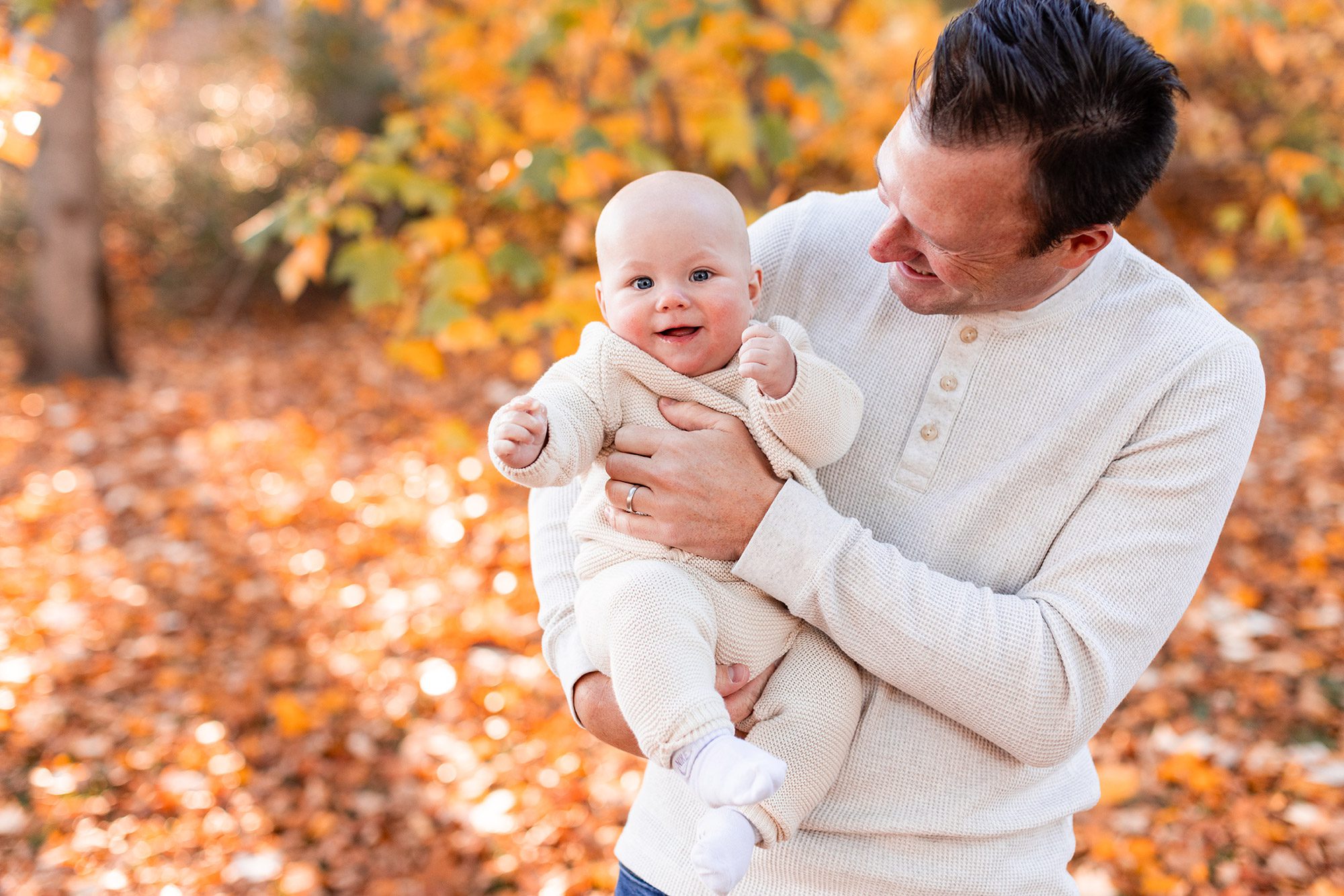 Boston Fall Family Photos - dad holding baby