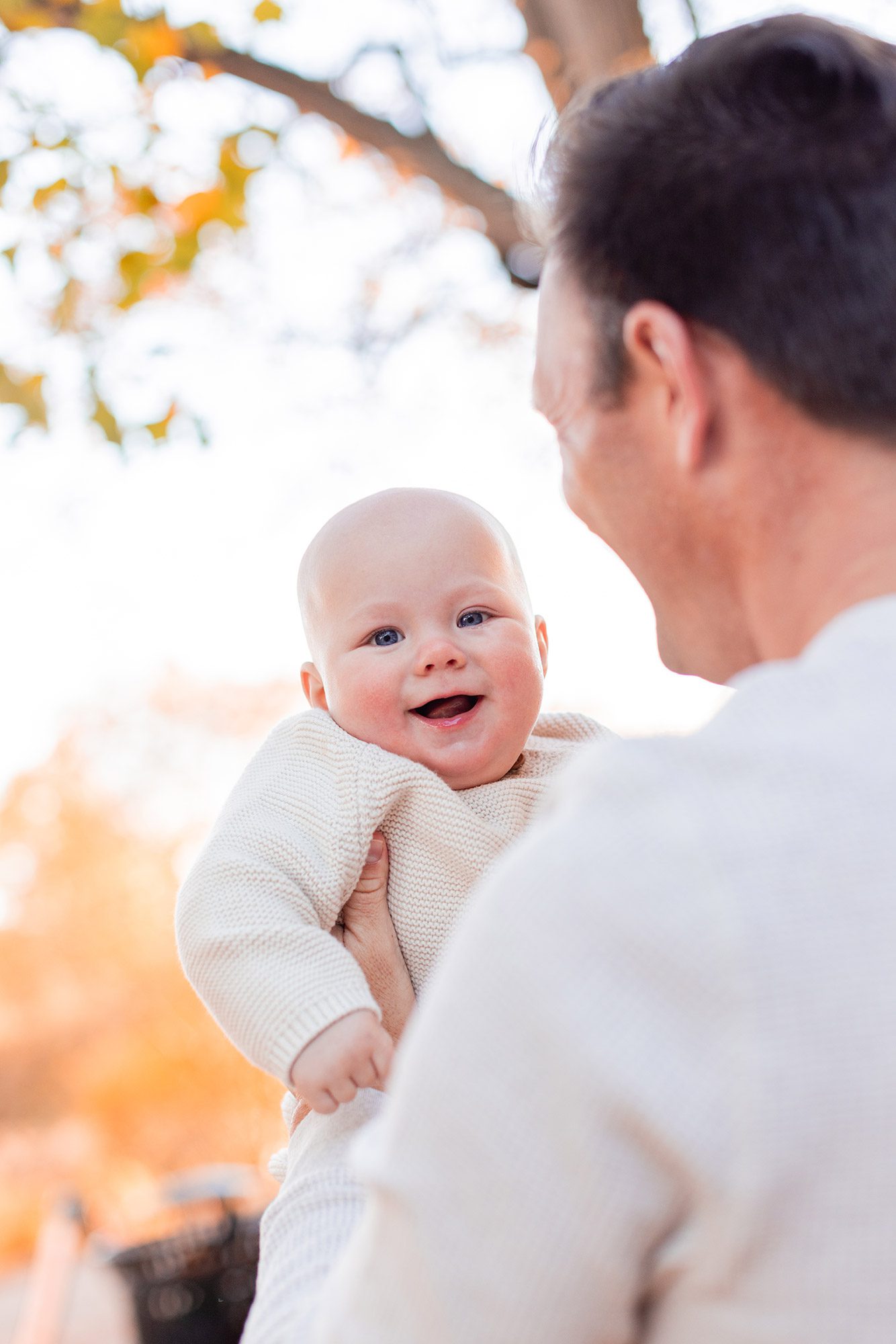 Boston Fall Family Photos - baby over dad's shoulder