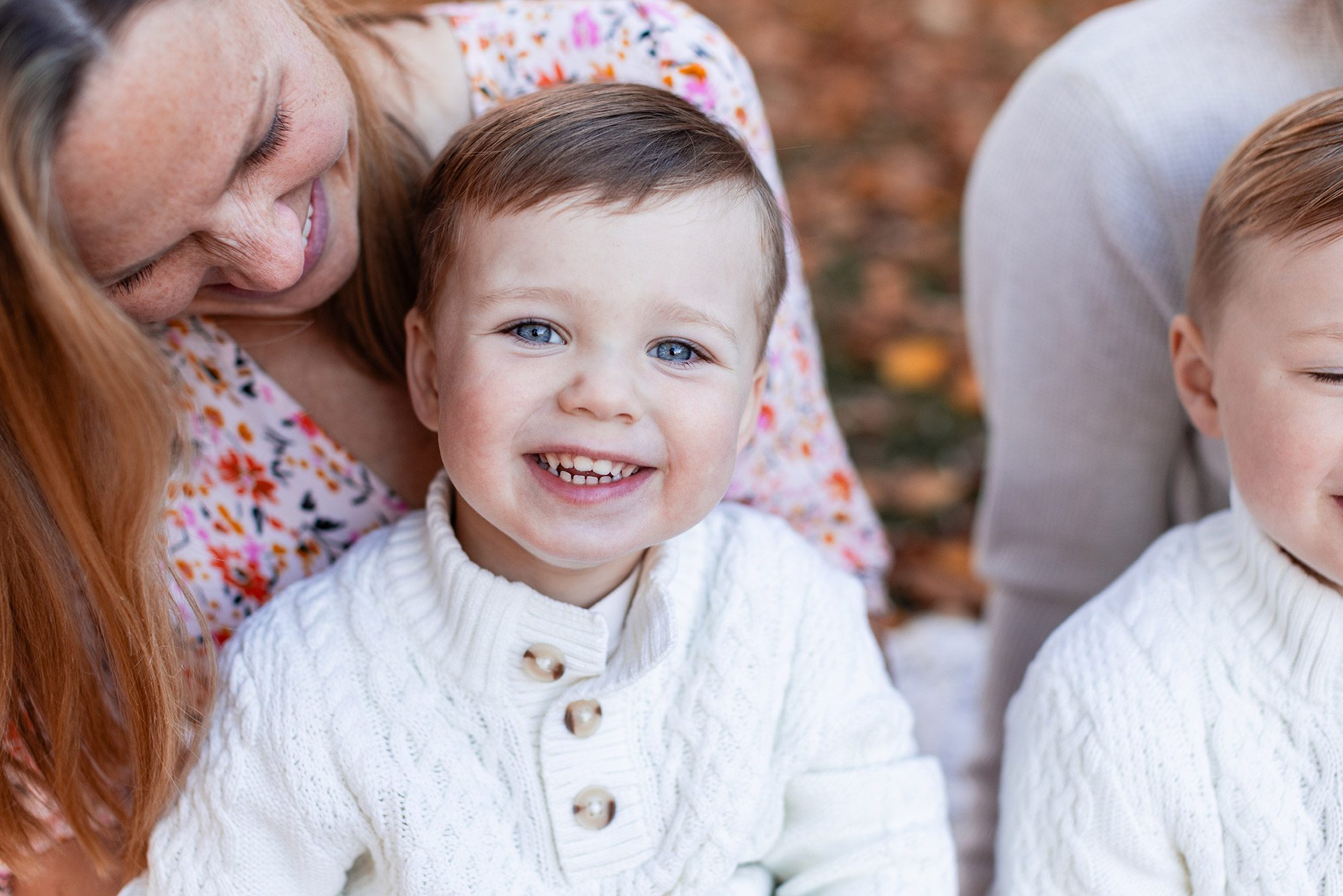 Boston Fall Family Photos - toddler laughing with mom