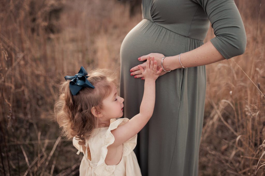 what to wear for your maternity photo session - simple sage jersey longsleeve dress with little girl
