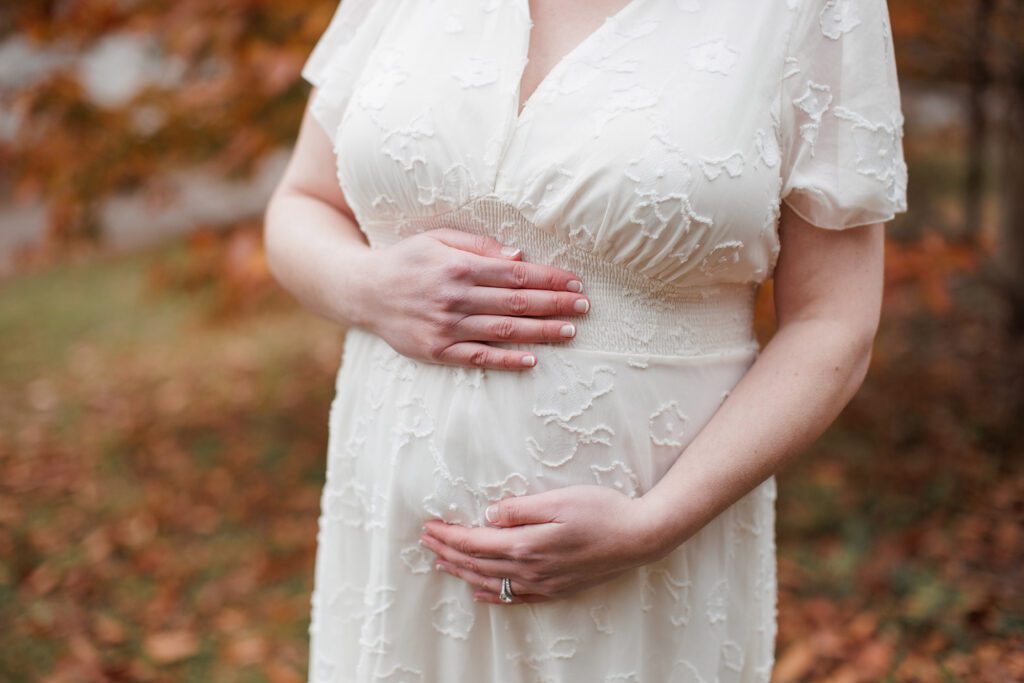 what to wear for your maternity photo session - white lace maternity dress