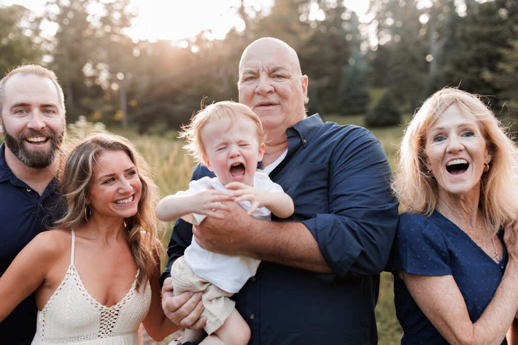 Boston extended family photographer: tips for amazing pictures - candid shot of baby crying