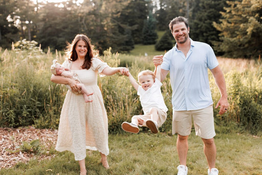 Boston extended family photographer: tips for amazing pictures - family of four playing with baby and big brother