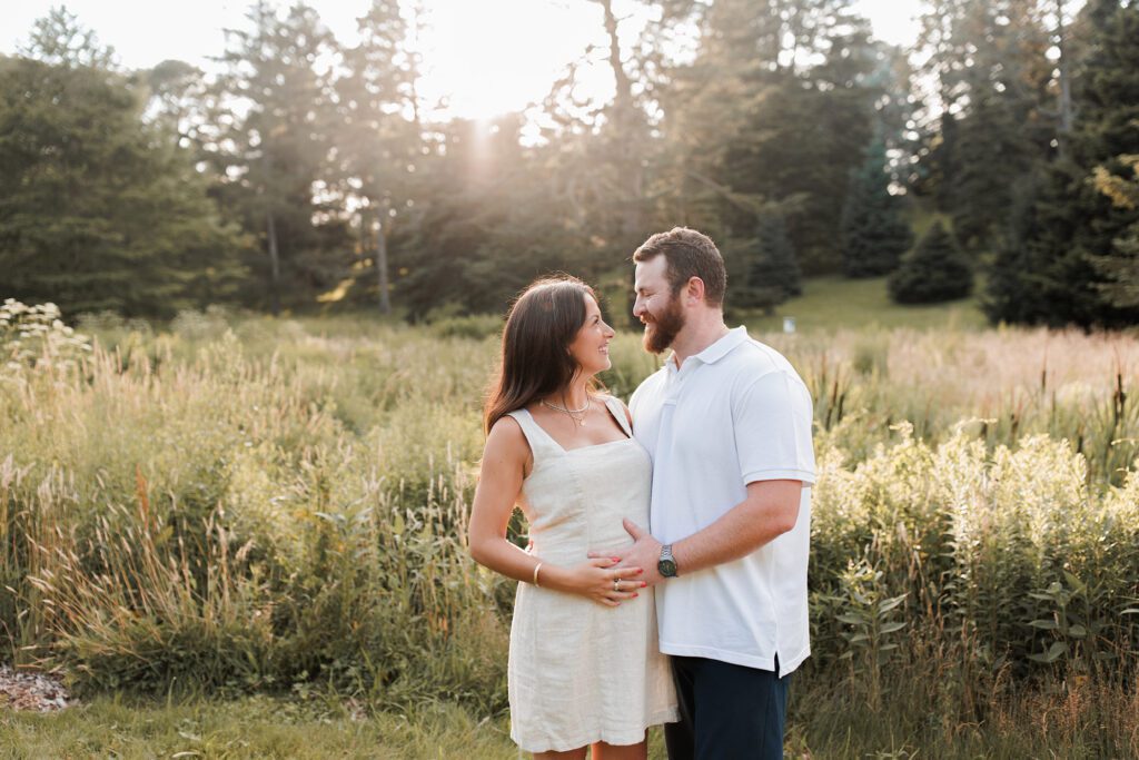 Boston extended family photographer: tips for amazing pictures - pregnant couple at the Arnold Arboretum