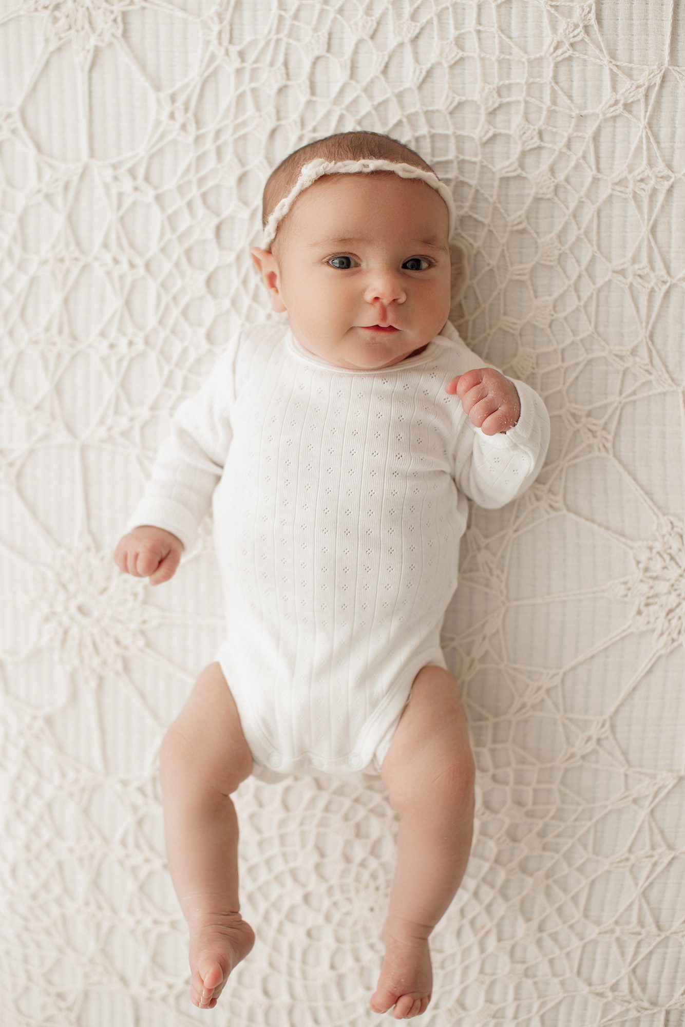 cozy minimalist newborn photoshoot Boston - skinny baby girl