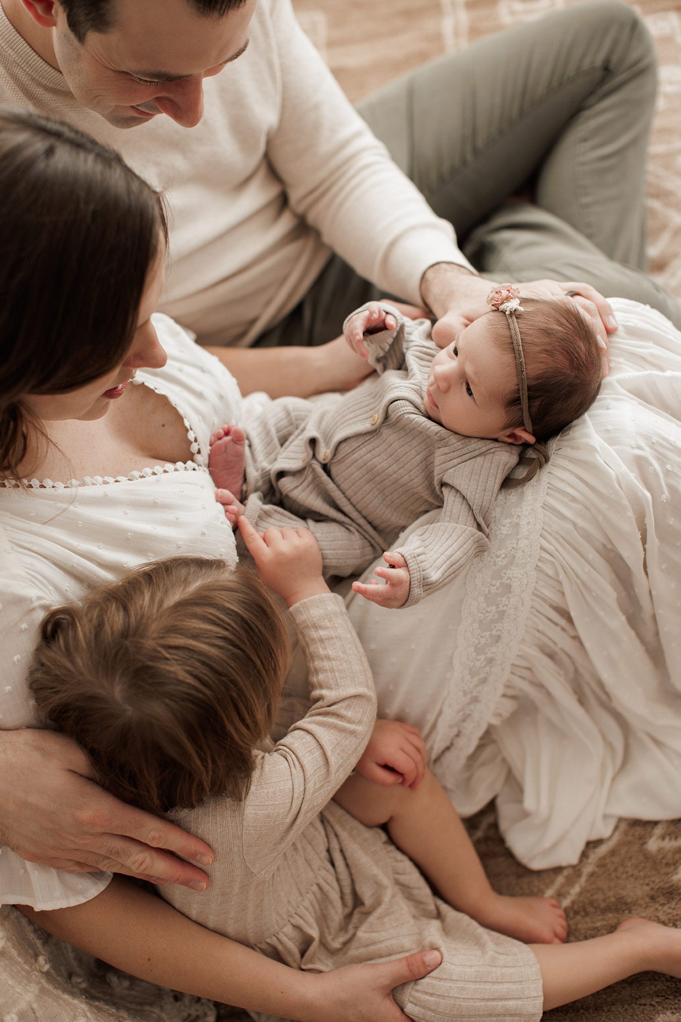 Best Location for a Newborn Photoshoot - family with baby
