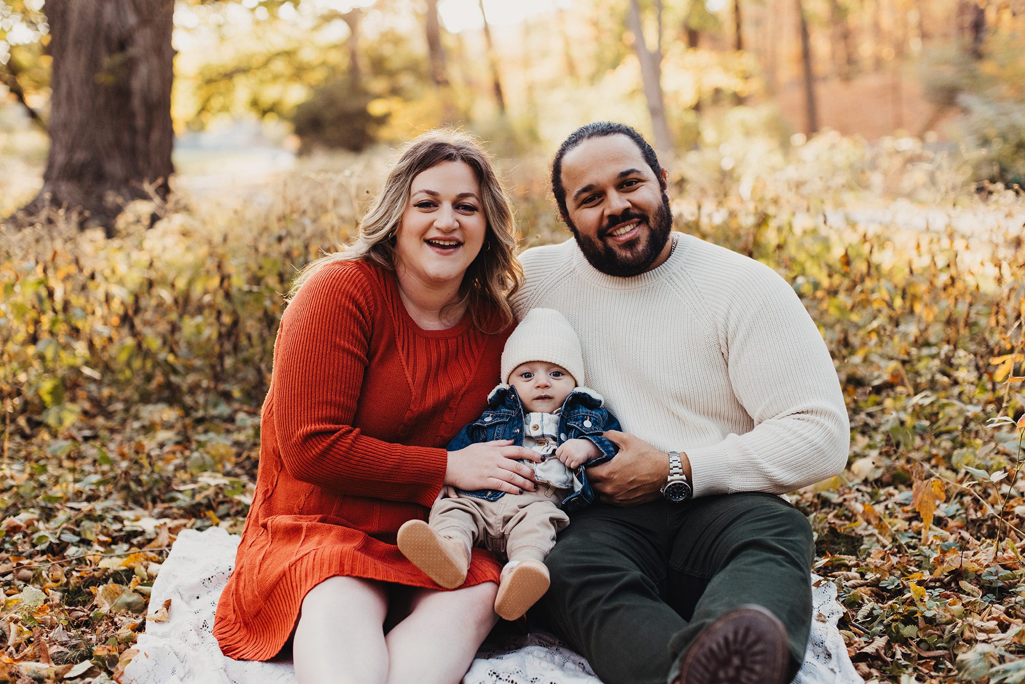 Annual Family Photos Boston Photographer - baby sitting on parents lap