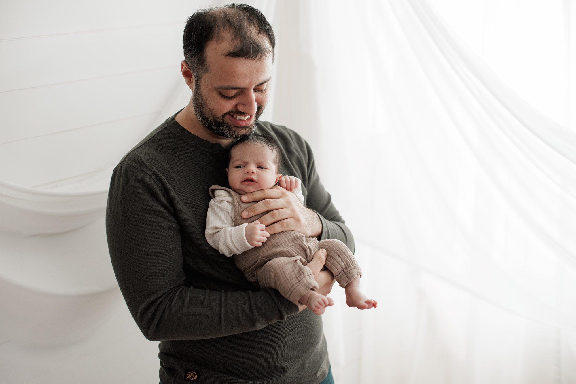 When should I book my newborn photos? -
