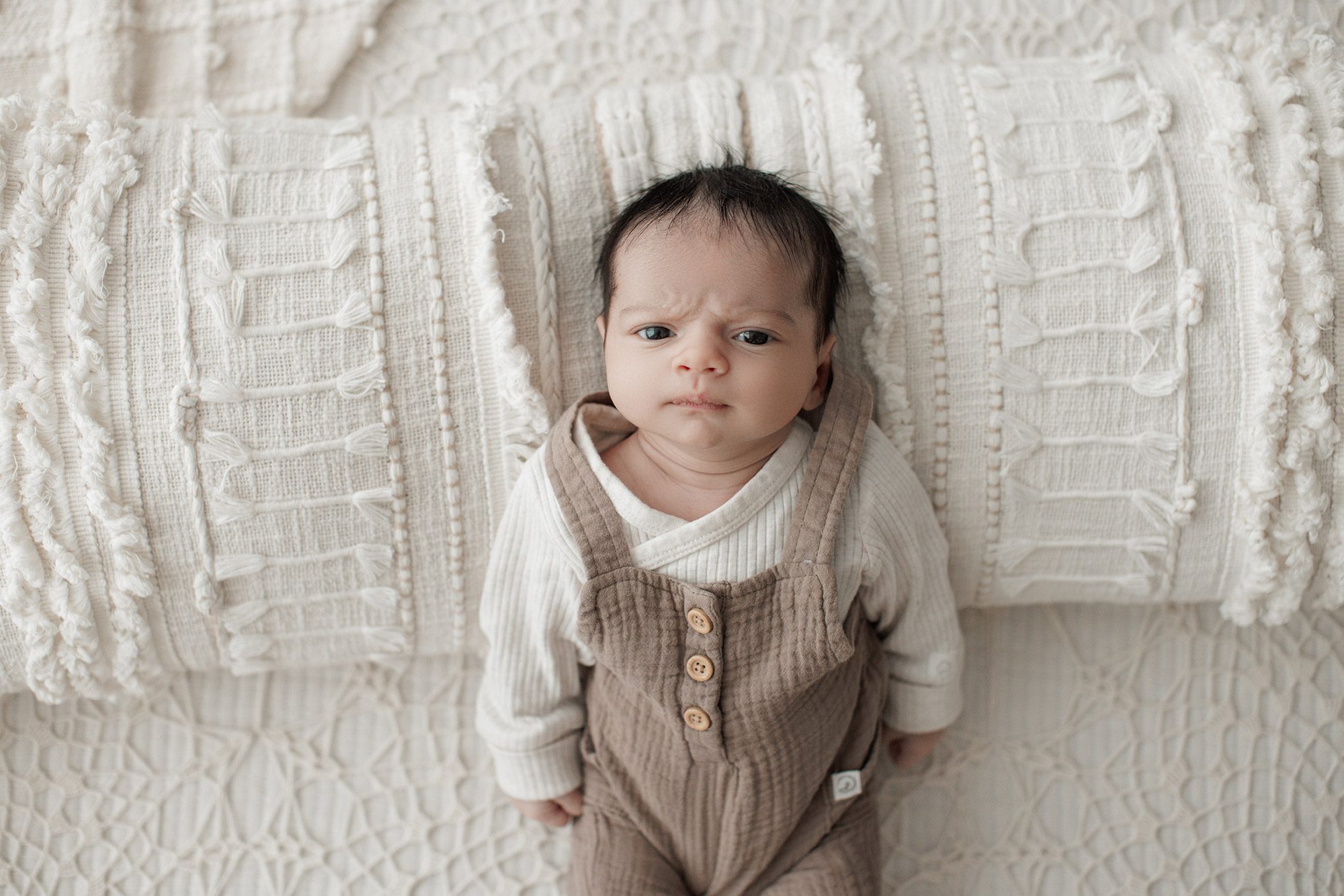 When should I book my newborn photos? -